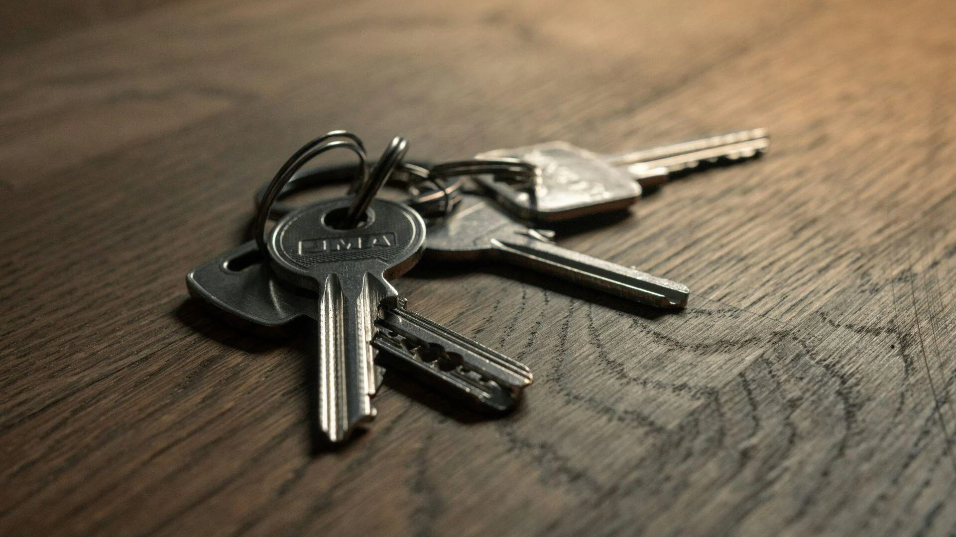 House keys on a wooden table