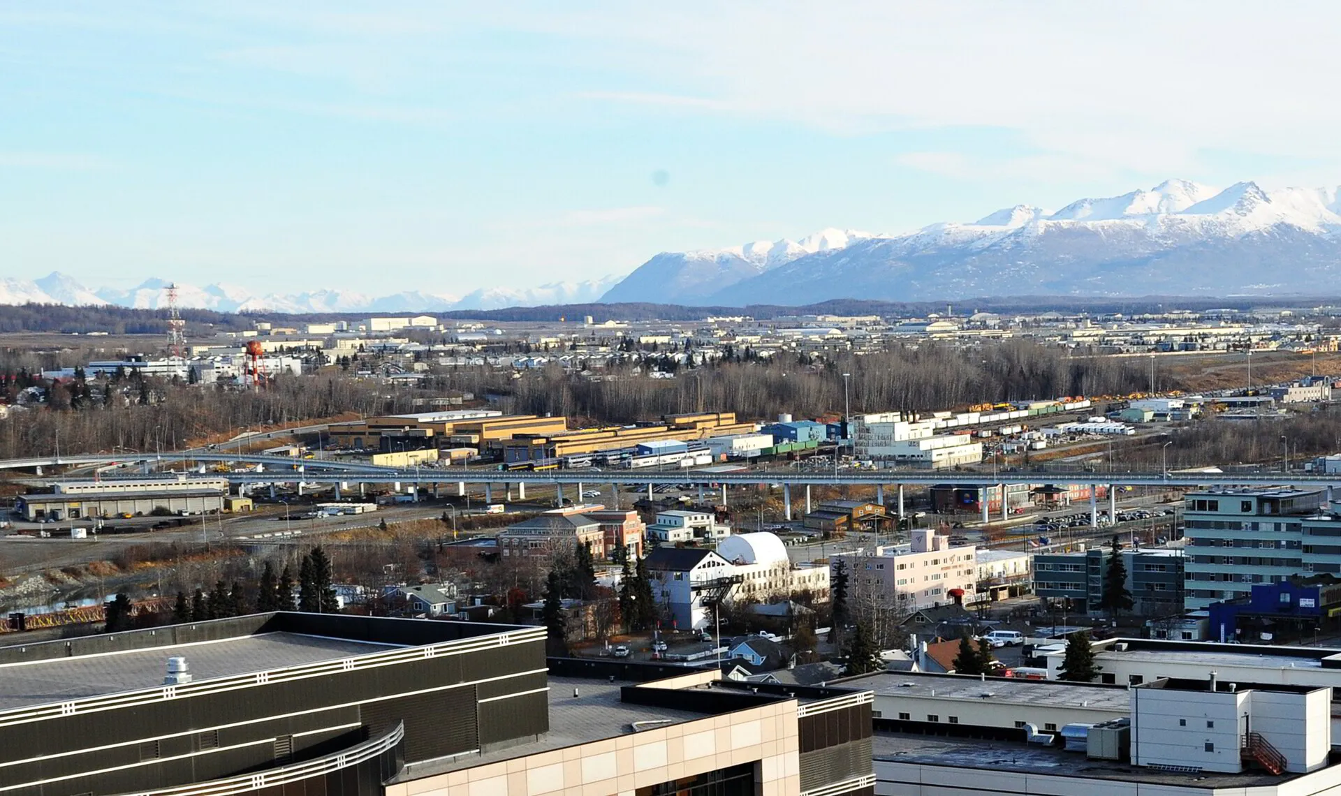 Government Hill neighborhood with JBER and Ship Creek Valley visible, the closest Anchorage neighborhood to the base and a top fourplex market.